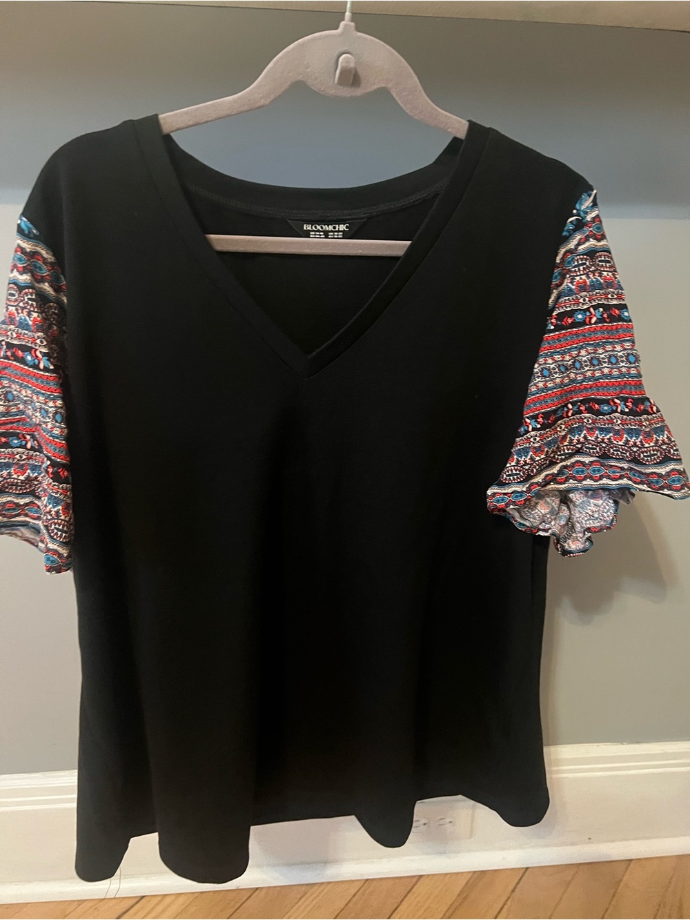 BloomChic  Black V-Neck Top with Multicolor Printed Puff Sleeves